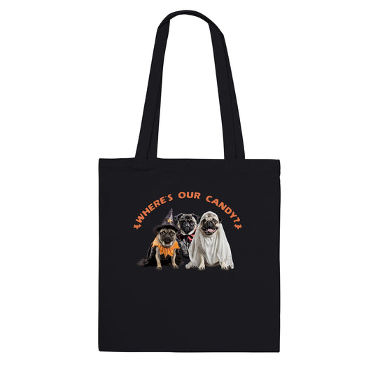 black tote bag with a picture of three pugs--one dressed as a witch, one dressed as a vampire, and one dressed as a ghost with the words "Where's our candy?" arched over them.