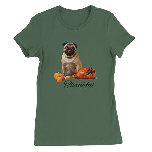 Military green women's t-shirt with a pug sitting behind pumpkins and a roast turkey with the word "Thankful" under it.