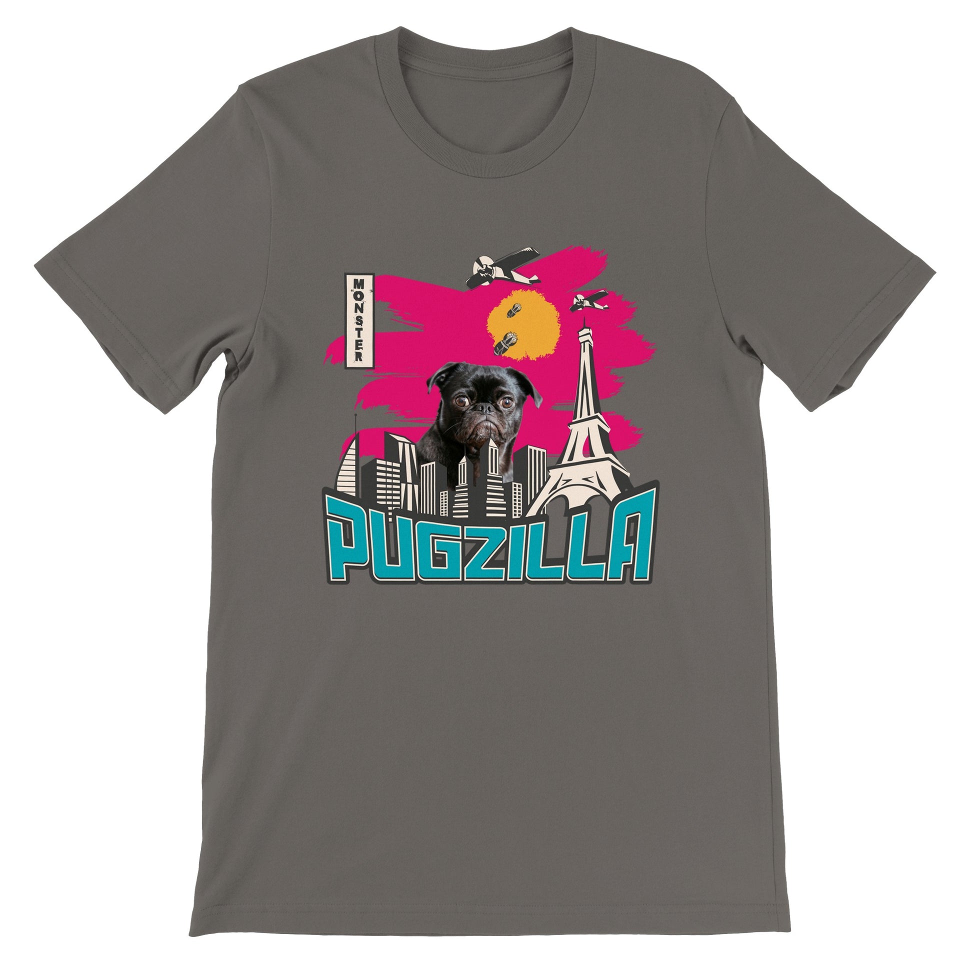 Asphalt-colored t-shirt with the image of a black pug standing over a cityscape under a pink sky with jets dropping bombs on him and with the word "Pugzilla" under it.