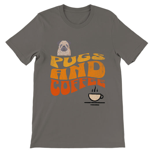 Asphalt t-shirt with  the words "Pugs and Coffee" in yellow, orange, and red in a retro, faded, wavy style. There is a picture of a cartoon pug above the words on the left and a line-drawing of a steaming cup of coffee below the words on the right.