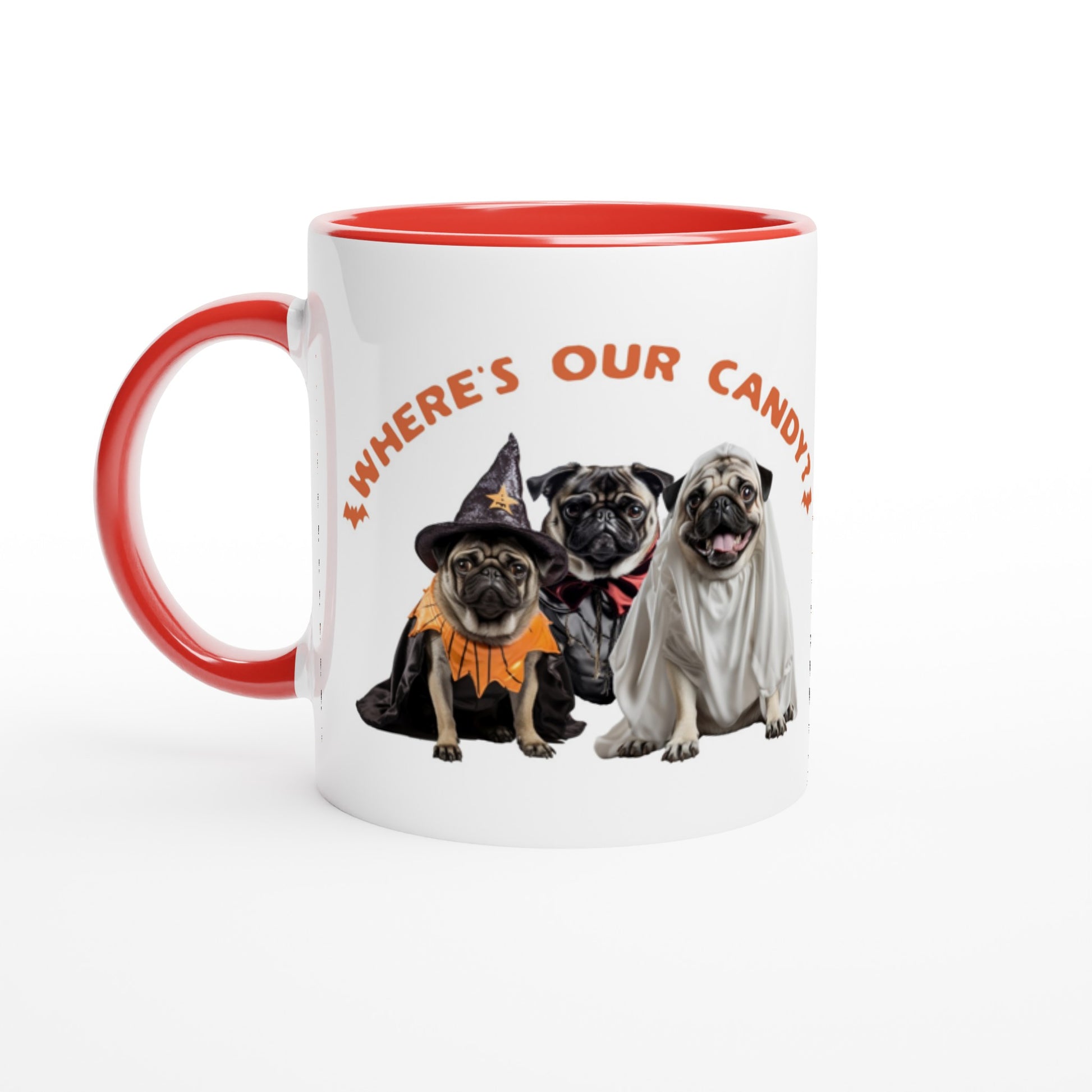 White mug with red handle, rim, and inside  with a picture of three pugs--one dressed as a witch, one dressed as a vampire, and one dressed as a ghost with the words "Where's our candy?" arched over them.