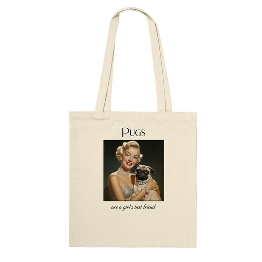 Natural beige color tote bag with Image of Marilyn Monroe wearing a chunky diamond necklace and bracelet and holding a fawn-colored pug who is wearing a matching diamond collar. The word "Pugs" is above the image and the words "are a girl's best friend" are under the image.