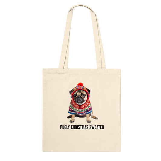 Natural beige-colored tote bag with a picture of a miserable-looking pug wearing an ugly Christmas sweater with a hood on it and the words "Pugly Christmas Sweater" below the image.