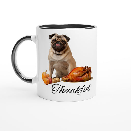 White mug with black handle, rim, and inside with a picture of a pug sitting behind pumpkins and a roast turkey with the word "Thankful" under it.