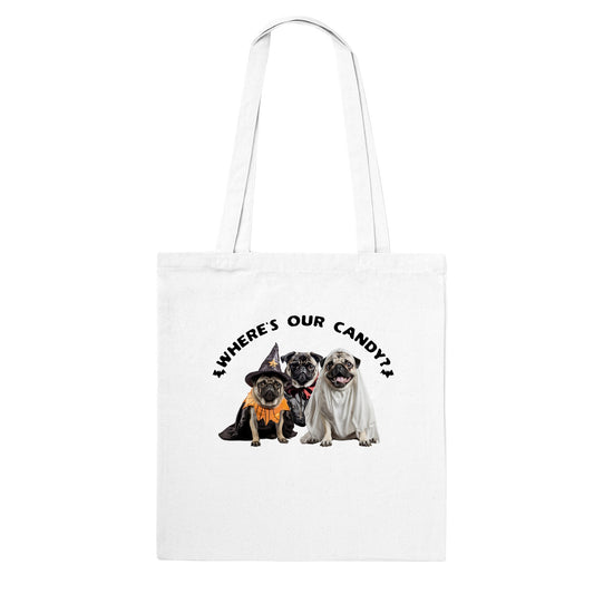 White tote bag with a picture of three pugs--one dressed as a witch, one dressed as a vampire, and one dressed as a ghost with the words "Where's our candy?" arched over them.