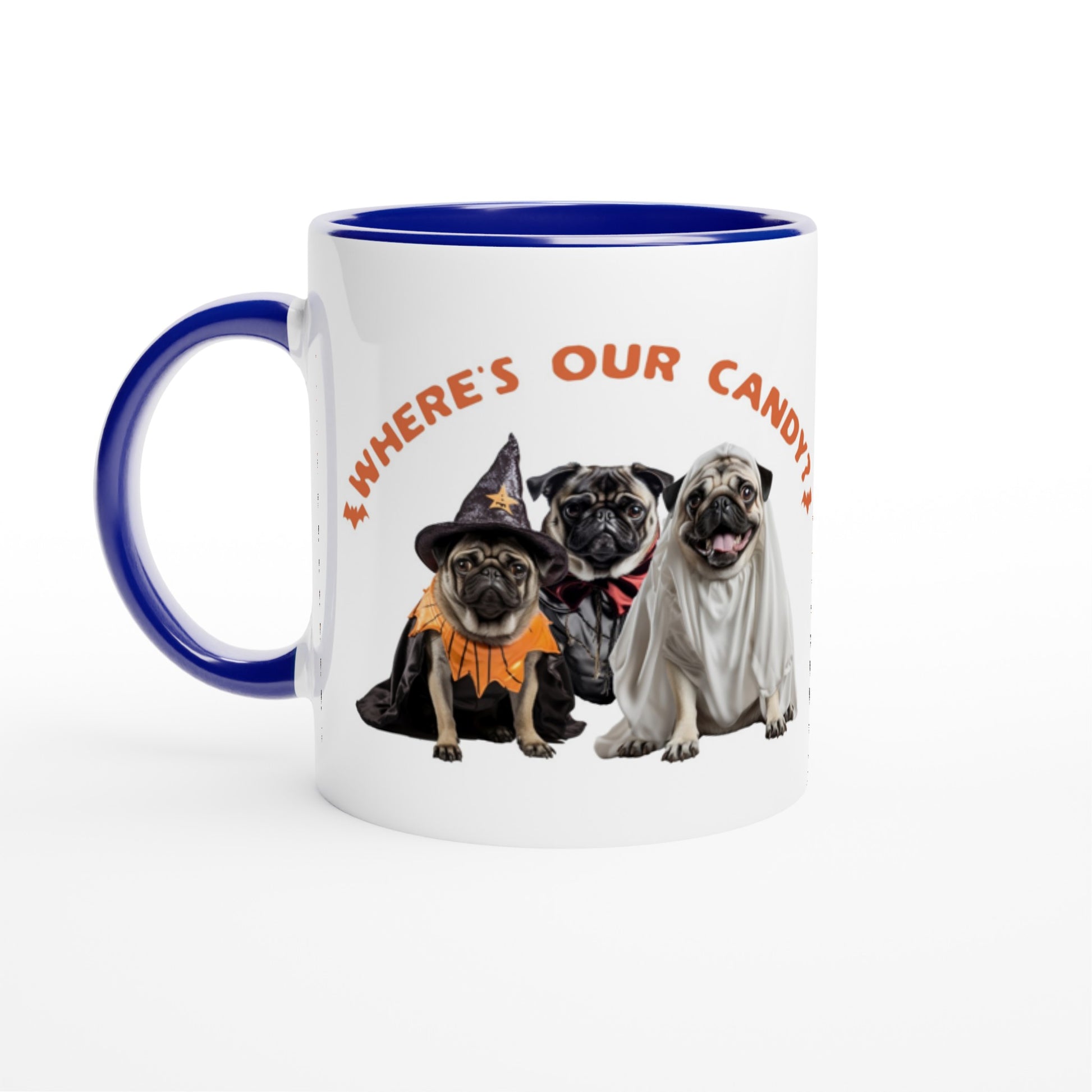 White mug with blue handle, rim, and inside  with a picture of three pugs--one dressed as a witch, one dressed as a vampire, and one dressed as a ghost with the words "Where's our candy?" arched over them.