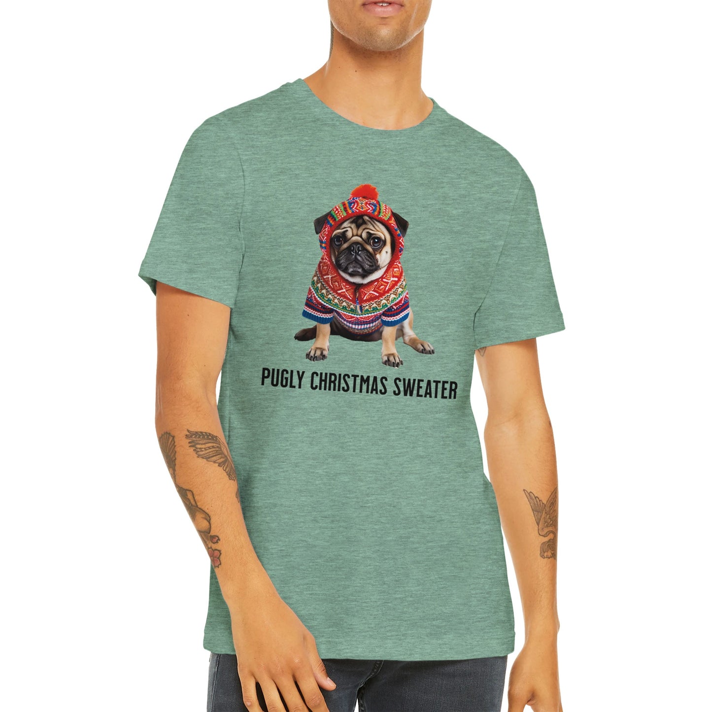 Torso of a male model wearing a heather mint green t-shirt with a picture of a miserable-looking pug wearing an ugly Christmas sweater with a hood on it and the words "Pugly Christmas Sweater" below the image.