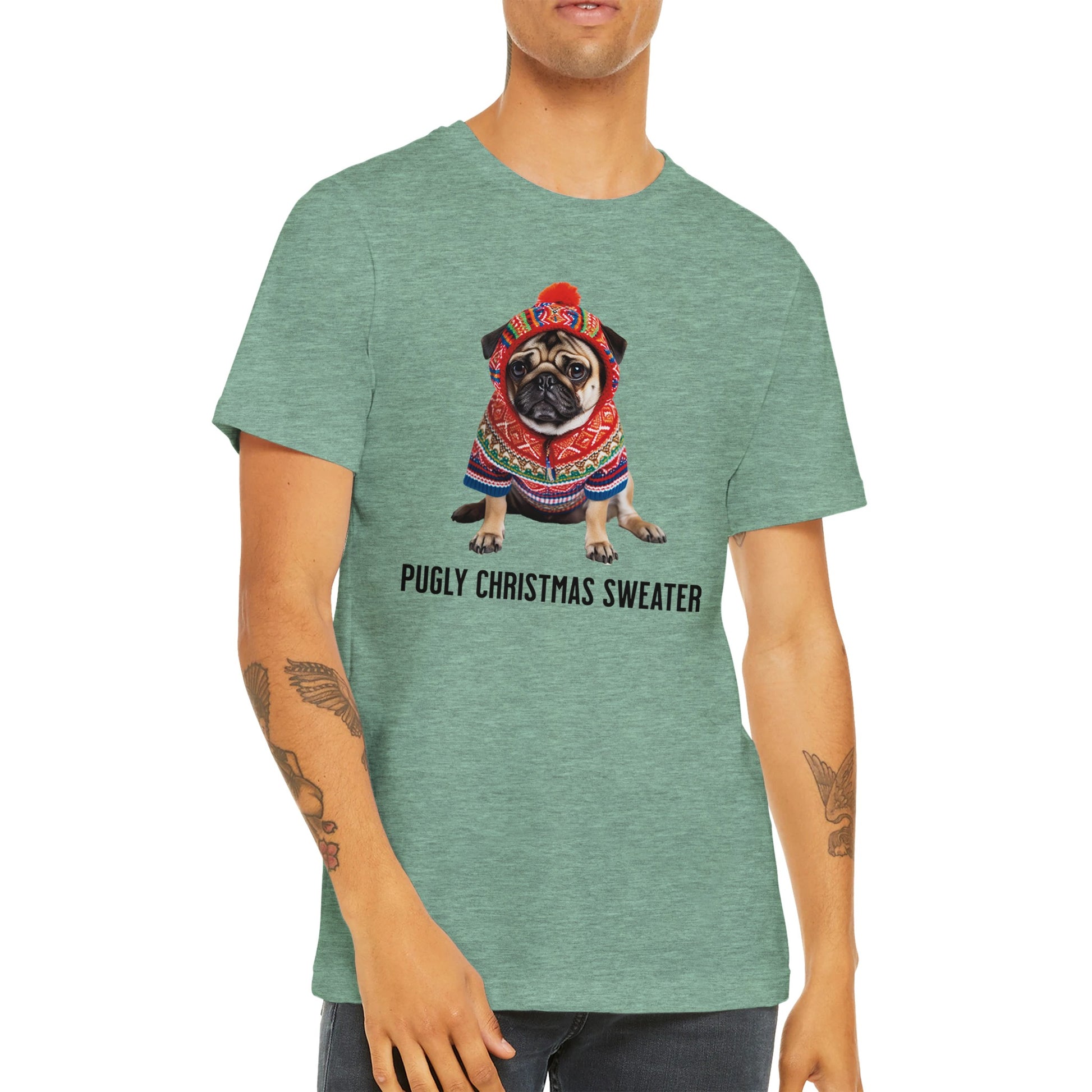 Torso of a male model wearing a heather mint green t-shirt with a picture of a miserable-looking pug wearing an ugly Christmas sweater with a hood on it and the words "Pugly Christmas Sweater" below the image.