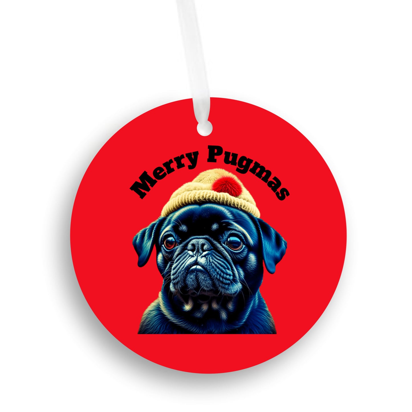 3 inch round ornament on a white background. The ornament is red with the words "Merry Pugmas" arched over the head of a black pug who is wearing a yellow winter hat with a pompom on it.